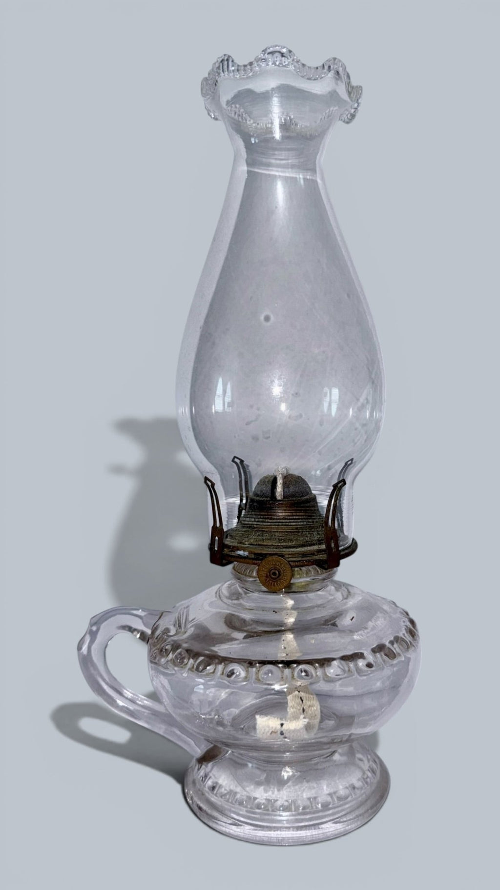 Antique Kerosene or Oil Bedside Footed Finger / Hand Lamp Complete w/ Chimney & Burner - AntiquesEtceteraAntique Kerosene or Oil Bedside Footed Finger / Hand Lamp Complete w/ Chimney & BurnerAntique Oil LampAntiquesEtceteraAntiquesEtcetera
