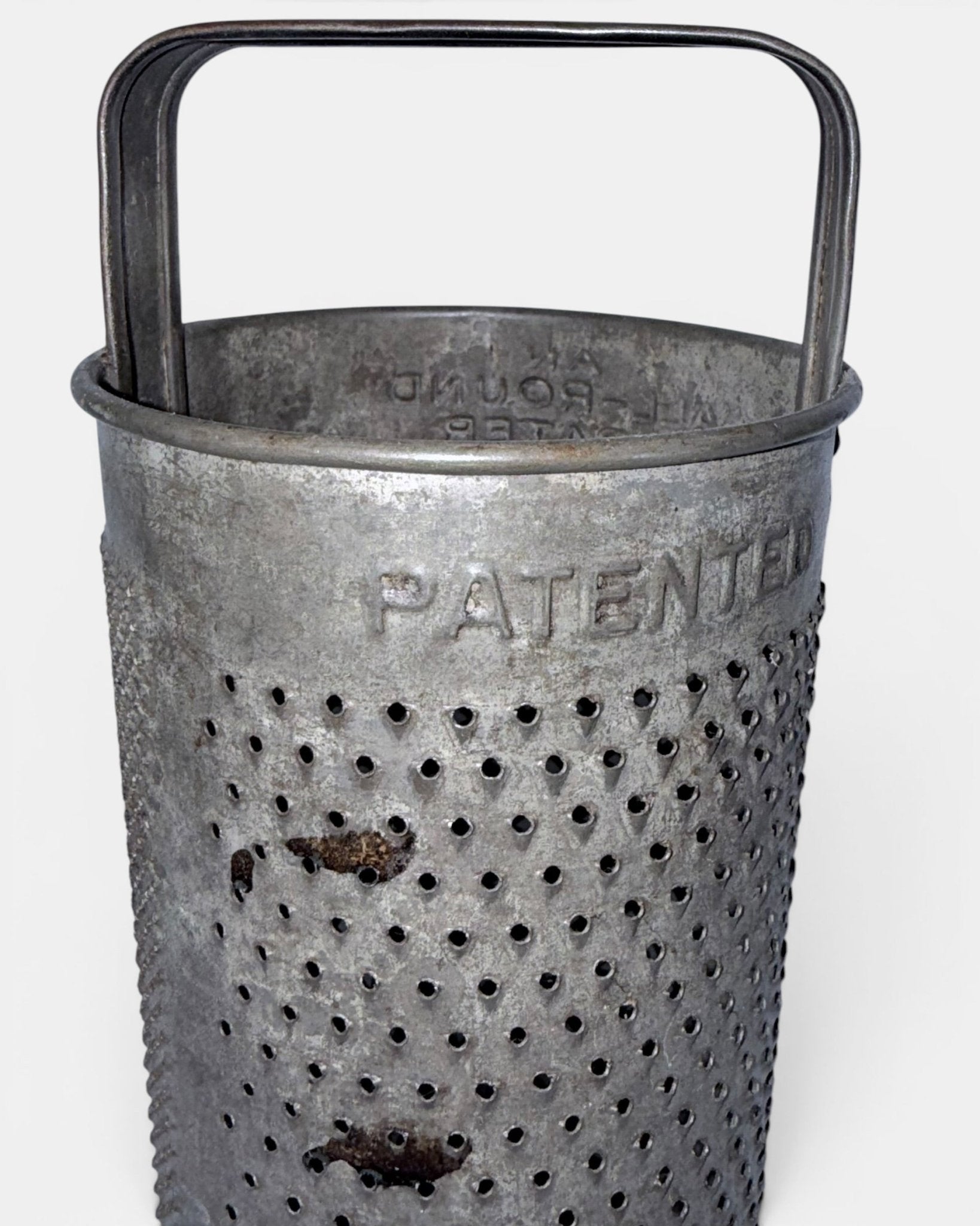 Antique Round Grater Country Store Decor "AN ALL-ROUND GRATER" with Handle - AntiquesEtceteraAntique Round Grater Country Store Decor "AN ALL-ROUND GRATER" with HandleAntique GraterAntiquesEtceteraAntiquesEtcetera