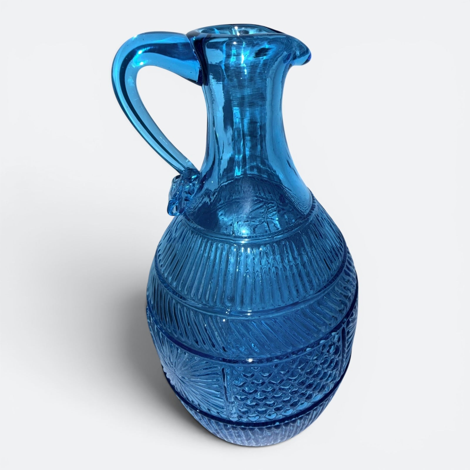 Blue Glass Jug / Ewer with Sunburst, Diamond and Ribbed Motif and Applied HandleAntiquesEtcetera