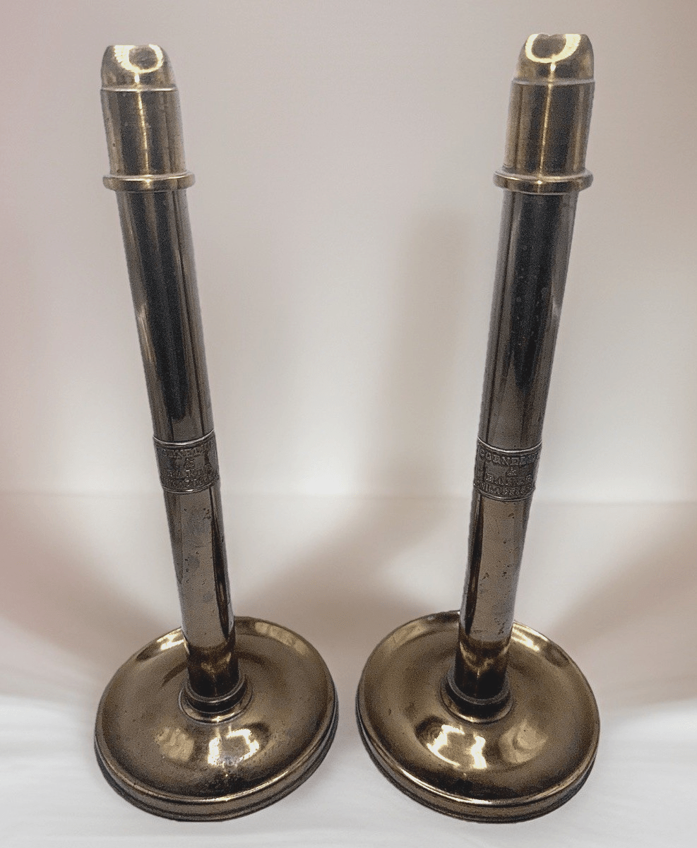 Cornelius & Baker Philadelphia Brass Candlesticks with Emblem & Wax Catcher Base - AntiquesEtceteraCornelius & Baker Philadelphia Brass Candlesticks with Emblem & Wax Catcher BaseAntiquesEtceteraAntiquesEtcetera