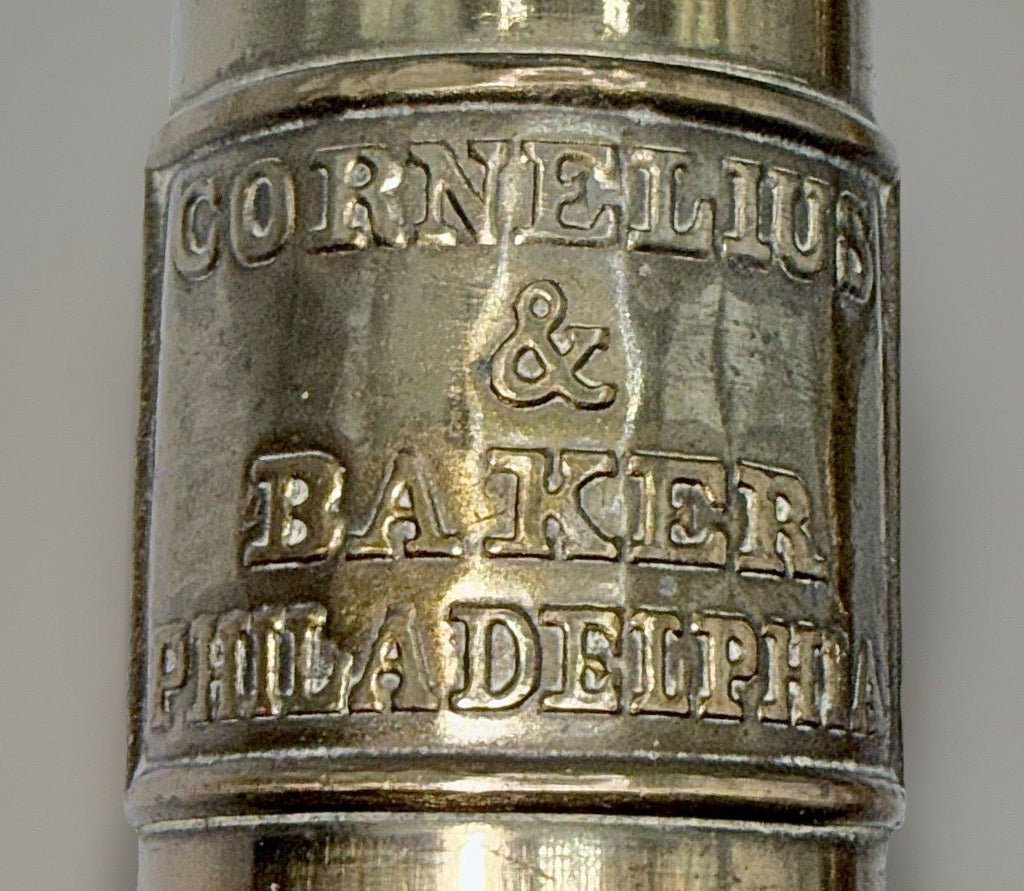 Cornelius & Baker Philadelphia Brass Candlesticks with Emblem & Wax Catcher Base - AntiquesEtceteraCornelius & Baker Philadelphia Brass Candlesticks with Emblem & Wax Catcher BaseAntiquesEtceteraAntiquesEtcetera