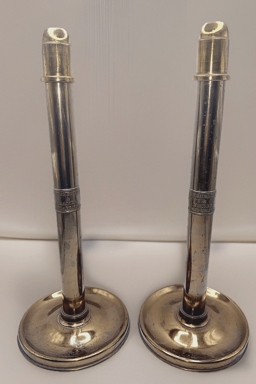 Cornelius & Baker Philadelphia Brass Candlesticks with Emblem & Wax Catcher Base - AntiquesEtceteraCornelius & Baker Philadelphia Brass Candlesticks with Emblem & Wax Catcher BaseAntiquesEtceteraAntiquesEtcetera