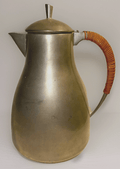 Dansk Pewter Water Pitcher w/ Original Rattan Wrapped Handle Danish Modern 1950s - AntiquesEtceteraDansk Pewter Water Pitcher w/ Original Rattan Wrapped Handle Danish Modern 1950sDansk DesignsAntiquesEtcetera