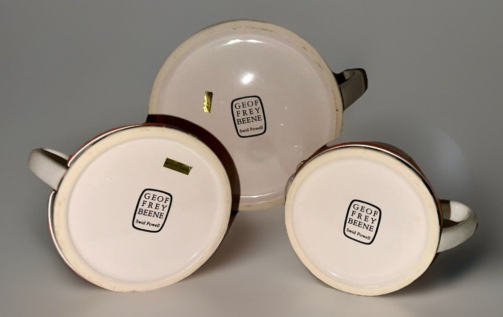 Geoffrey Beene Swid Powell Tea Set with Pot, Sugar, Creamer Insulated Orange Tin - AntiquesEtceteraGeoffrey Beene Swid Powell Tea Set with Pot, Sugar, Creamer Insulated Orange TinSwid PowellAntiquesEtcetera