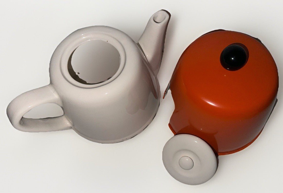 Geoffrey Beene Swid Powell Tea Set with Pot, Sugar, Creamer Insulated Orange Tin - AntiquesEtceteraGeoffrey Beene Swid Powell Tea Set with Pot, Sugar, Creamer Insulated Orange TinSwid PowellAntiquesEtcetera