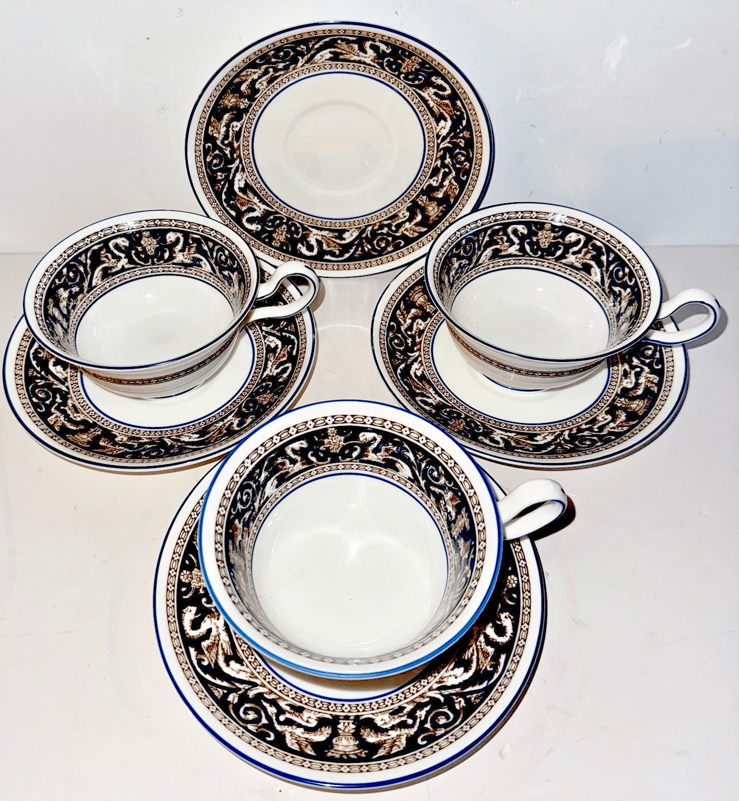 Set of 3 Wedgwood Florentine Bone China Tea Cups w/ 4 Saucers Griffin Bands Blue - AntiquesEtceteraSet of 3 Wedgwood Florentine Bone China Tea Cups w/ 4 Saucers Griffin Bands BlueWedgwoodAntiquesEtcetera
