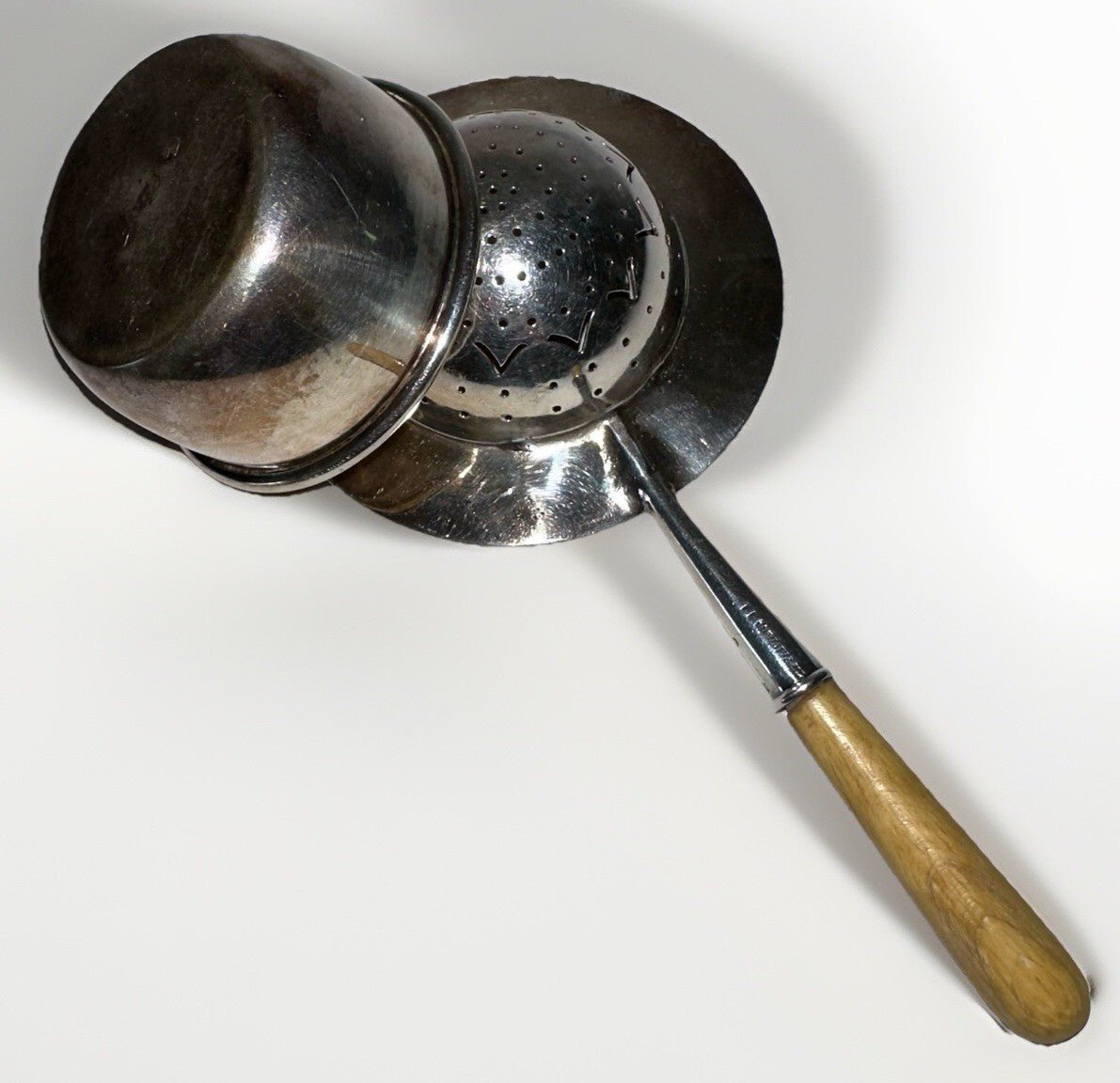 Tiffany & Co Silver Plate Tea Strainer w/ Fruitwood Handle & Silver Holder / Cup - AntiquesEtceteraTiffany & Co Silver Plate Tea Strainer w/ Fruitwood Handle & Silver Holder / CupTiffany & Co.AntiquesEtcetera