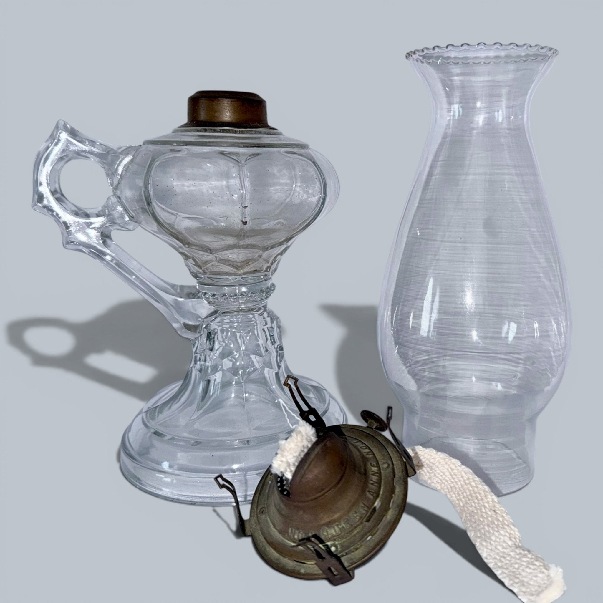 Victorian Oil or Kerosene Footed Hand Lamp / Complete with Chimney and Working Burner - AntiquesEtceteraVictorian Oil or Kerosene Footed Hand Lamp / Complete with Chimney and Working BurnerAntique Oil LampAntiquesEtceteraAntiquesEtcetera
