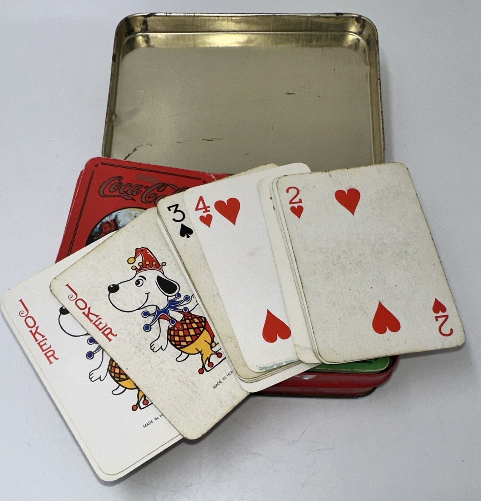 Vintage Coca Cola Hinged Tin with 2 Packs of Snoopy Playing Cards - AntiquesEtceteraVintage Coca Cola Hinged Tin with 2 Packs of Snoopy Playing CardsCoca - ColaAntiquesEtcetera